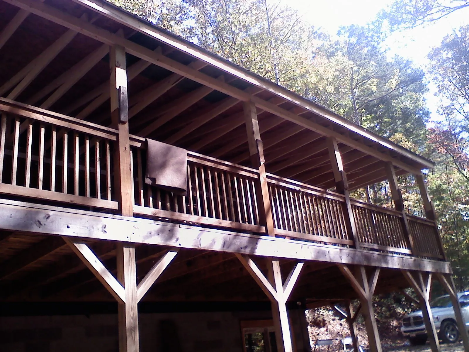 Timber framing under a new elevated porch and deck — Roof Leak Repair in Mount Enterprise by Roofing Brothers